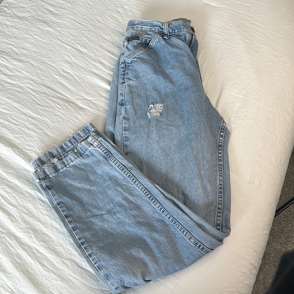 Vintage ripped light denim jeans